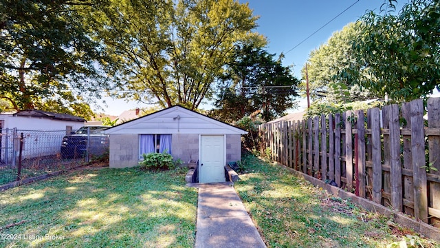 view of outdoor structure with a yard