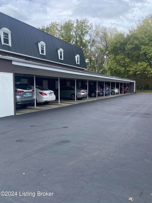 view of car parking featuring a carport