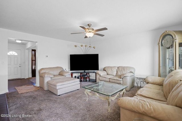 living room with ceiling fan and hardwood / wood-style floors