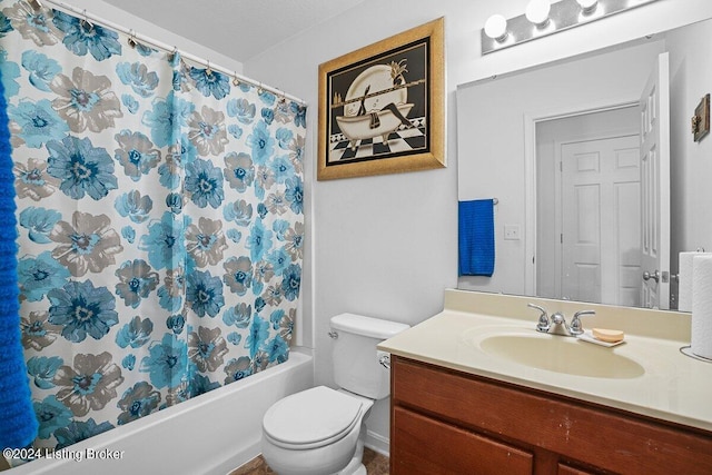 full bathroom with shower / bathtub combination with curtain, vanity, and toilet