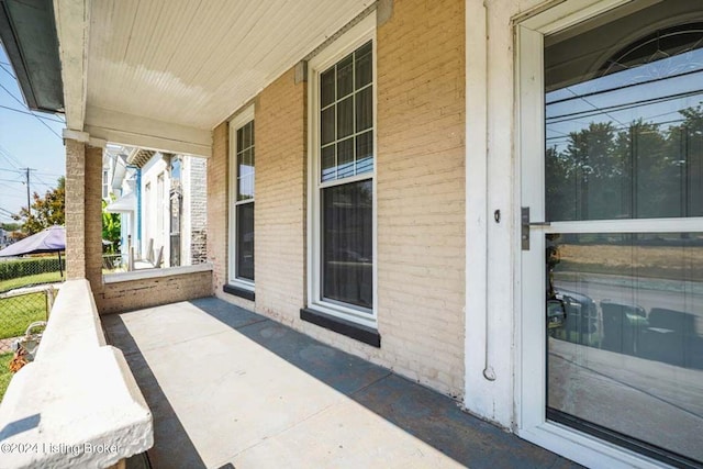 view of patio featuring a porch