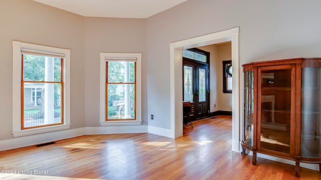 unfurnished room featuring light wood-type flooring