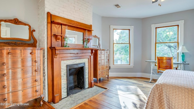 bedroom with light hardwood / wood-style flooring