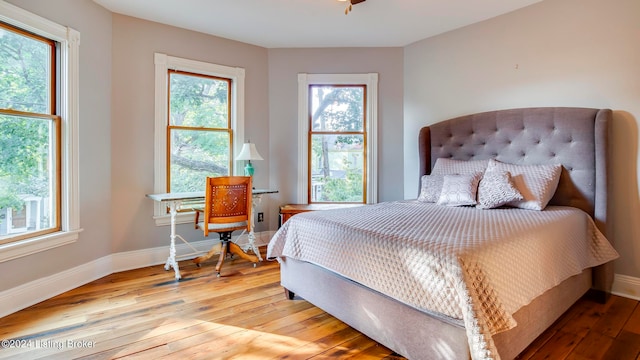 bedroom featuring hardwood / wood-style flooring