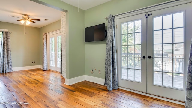 doorway featuring ceiling fan, french doors, and a wealth of natural light