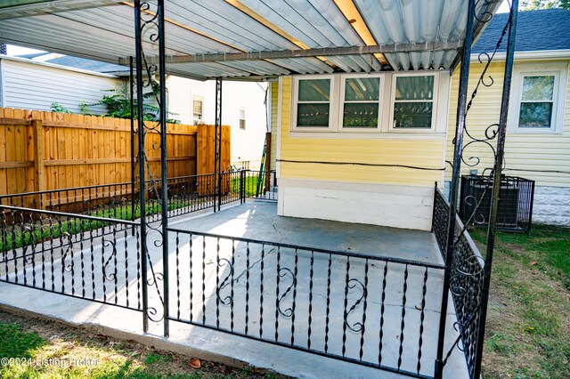 view of patio / terrace with central AC unit