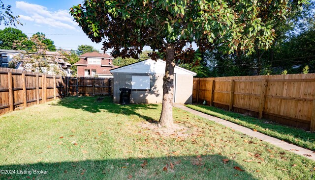 view of yard featuring a storage unit