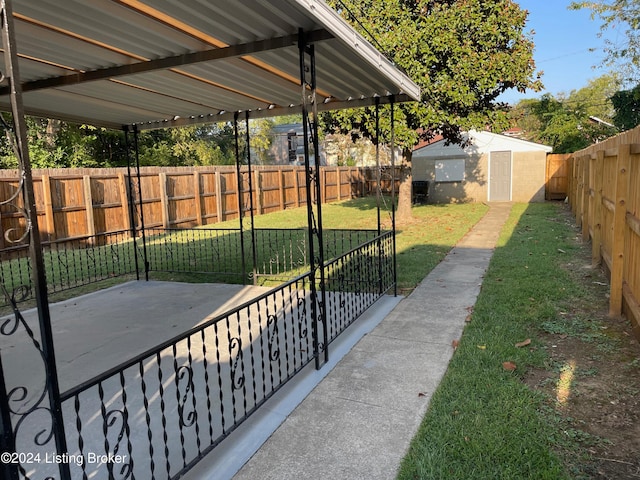 view of patio featuring an outbuilding