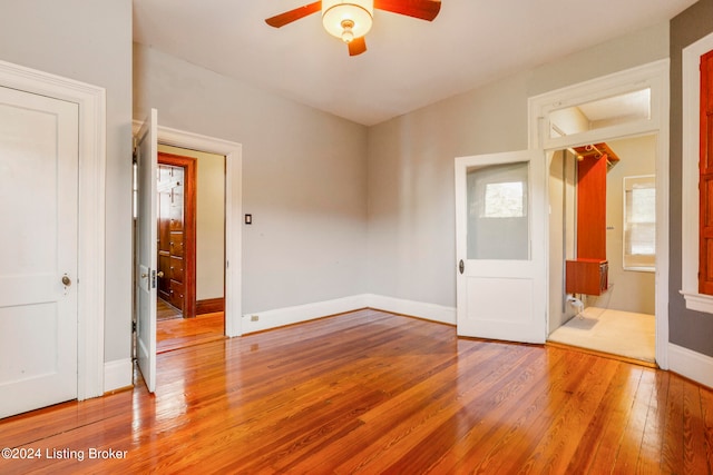 interior space featuring hardwood / wood-style flooring and ceiling fan