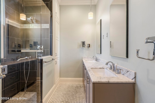 bathroom with vanity and a shower with door