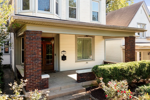 doorway to property featuring covered porch