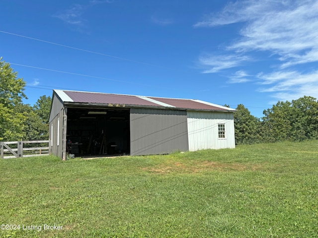 view of outdoor structure with a yard