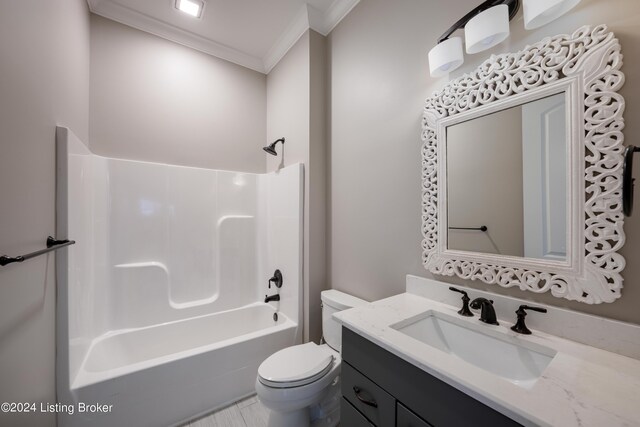 full bathroom featuring shower / bathtub combination, crown molding, vanity, and toilet