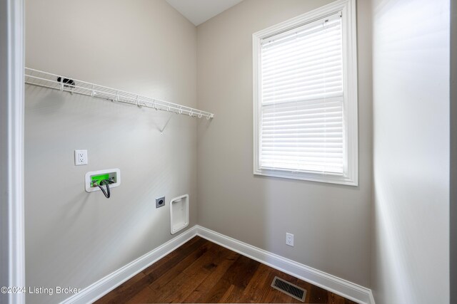 laundry area with hookup for a washing machine, dark hardwood / wood-style flooring, and electric dryer hookup