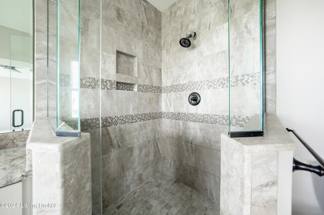 bathroom with an enclosed shower