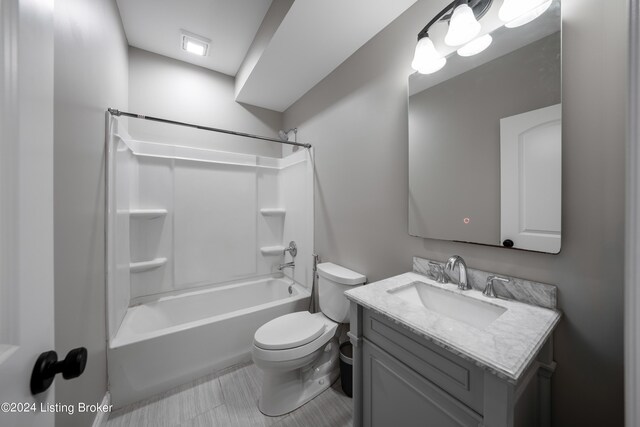 full bathroom with shower / bathing tub combination, vanity, and toilet