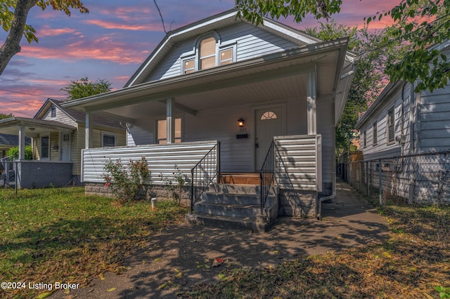 view of front of home featuring covered porch