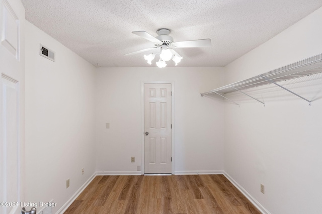 interior space featuring ceiling fan and hardwood / wood-style flooring