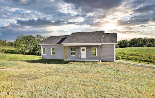 view of front of house featuring a front lawn