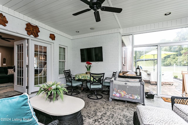 exterior space featuring ceiling fan