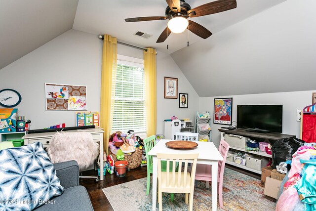 playroom with lofted ceiling, ceiling fan, and dark hardwood / wood-style floors