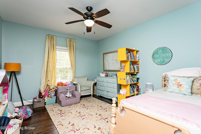 bedroom featuring ceiling fan and dark hardwood / wood-style flooring