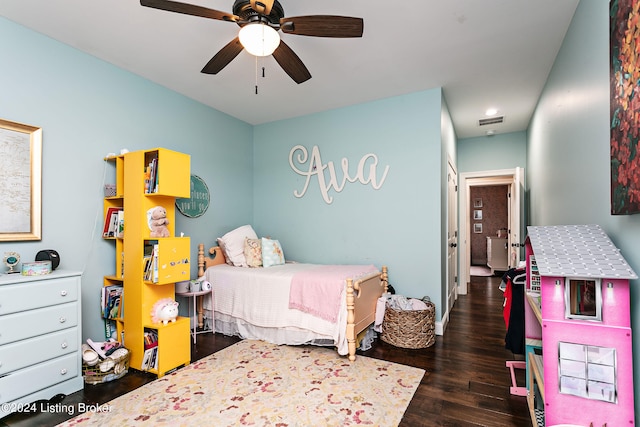 bedroom featuring ceiling fan and dark hardwood / wood-style flooring