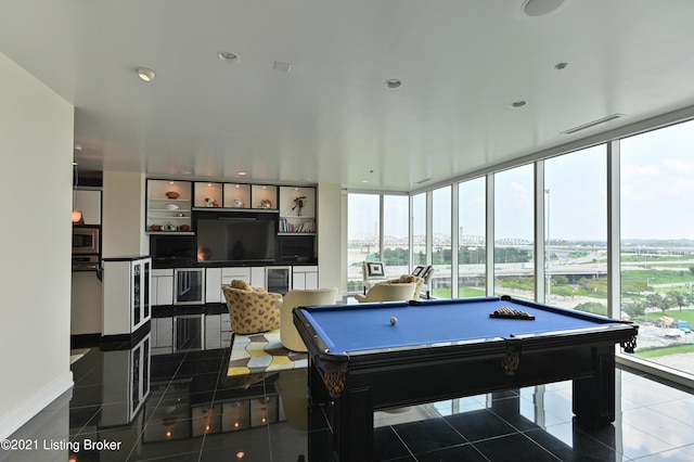 game room with tile patterned flooring, visible vents, billiards, and a wall of windows