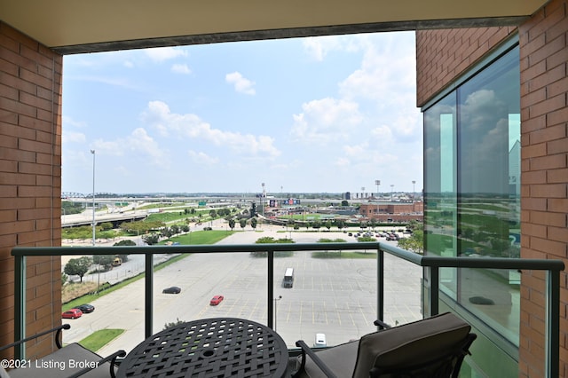 balcony featuring a city view