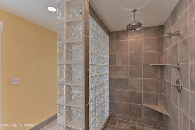 full bath with recessed lighting and tiled shower