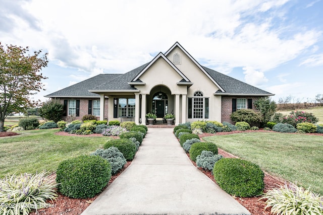 view of front of house with a front lawn