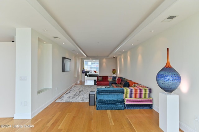 222 E Witherspoon St Unit 703-704, Louisville, KY 40202 - hall with a raised ceiling, visible vents, recessed lighting, and light wood finished floors