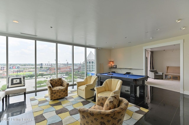 interior space featuring a wall of windows, billiards, and light tile patterned floors