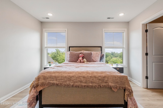 bedroom featuring light wood-type flooring