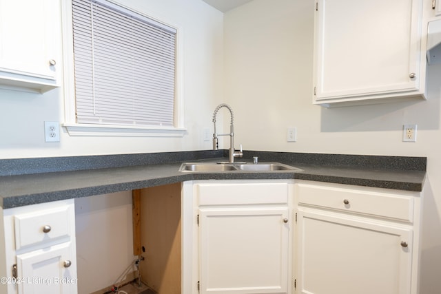 kitchen with white cabinets and sink