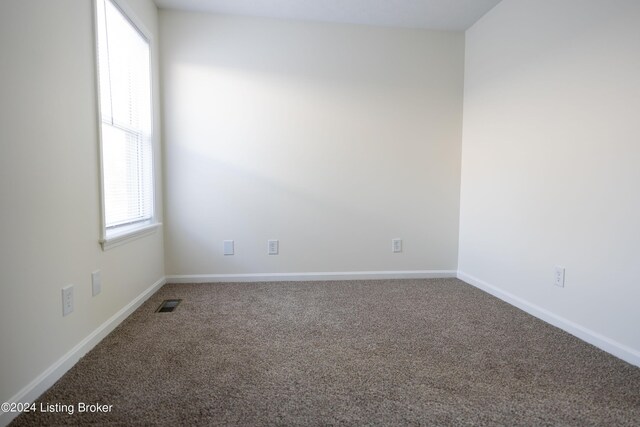 view of carpeted spare room