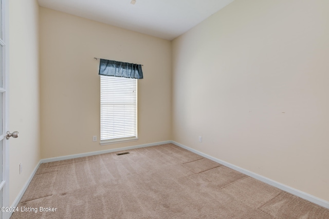 view of carpeted spare room