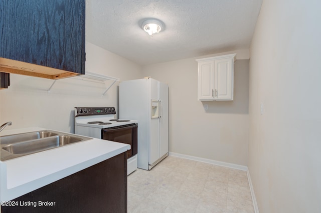 kitchen featuring white cabinets, a textured ceiling, sink, and white appliances