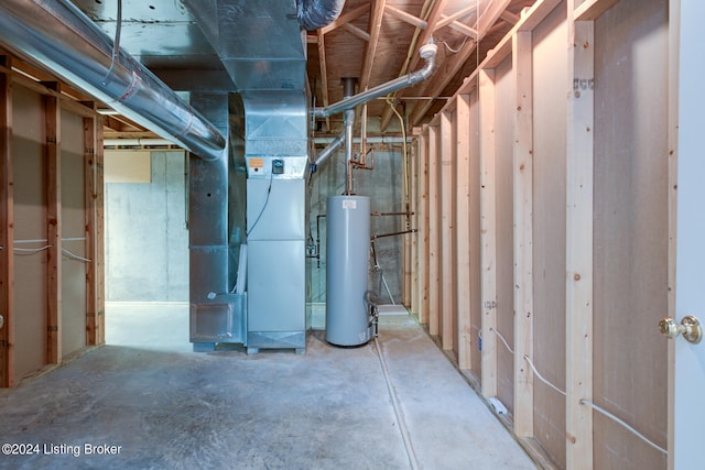 basement with heating unit and water heater