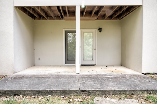 property entrance with a patio