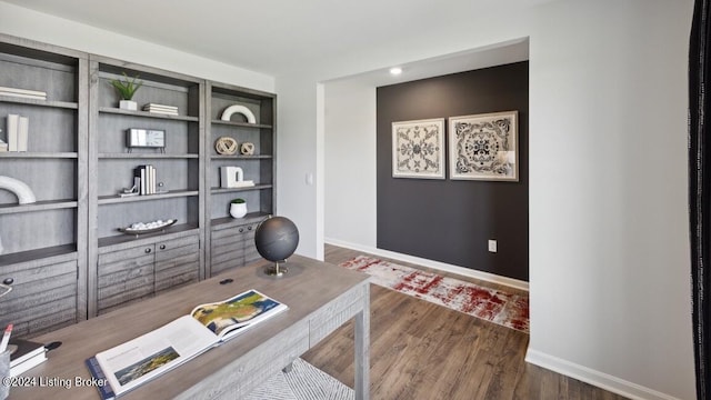 office with dark wood-type flooring