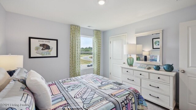 bedroom featuring carpet