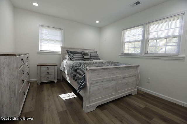 bedroom featuring dark hardwood / wood-style floors