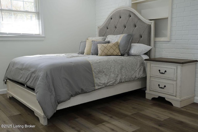 bedroom featuring dark wood-type flooring