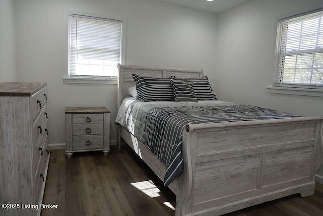 bedroom featuring dark hardwood / wood-style flooring