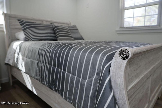 bedroom with wood-type flooring