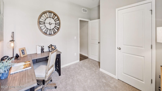 home office featuring light colored carpet