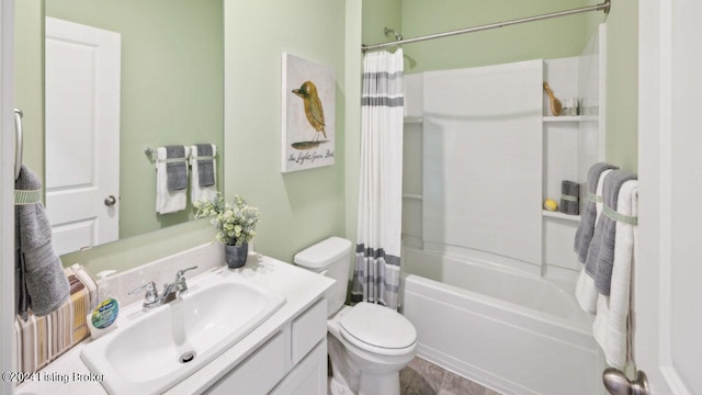 full bathroom with vanity, shower / bath combo with shower curtain, and toilet