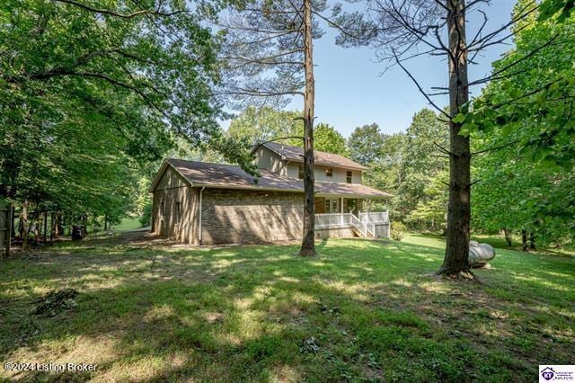 2656 Doe Valley Pkwy, Brandenburg, KY 40108 - view of yard featuring a porch