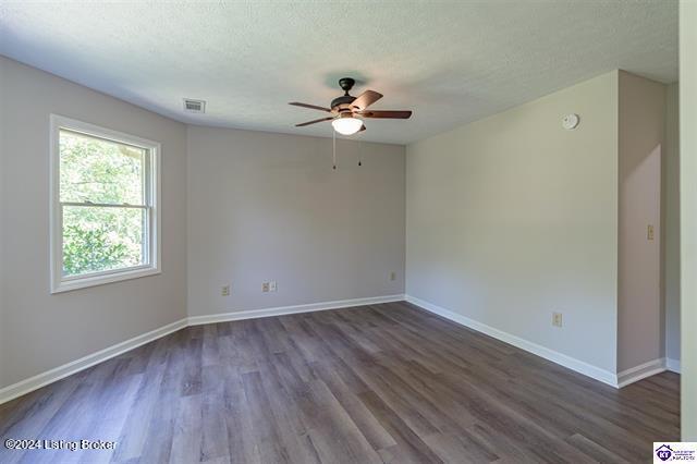 2656 Doe Valley Pkwy, Brandenburg, KY 40108 - empty room with baseboards, a textured ceiling, visible vents, and a ceiling fan